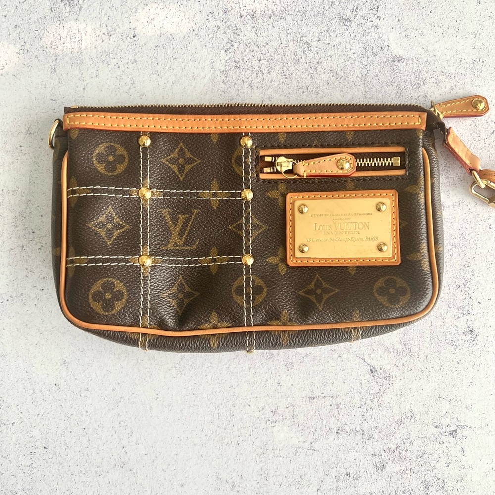 Louis Vuitton rare RIVETING POCHETTE beautiful condition. Authenticated